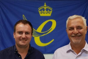Brad Aspess (right) and Rob Evans (left) from Rarewaves with the Queens Award for Enterprise flag