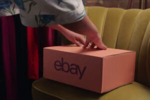 Lady opening eBay branded packaging