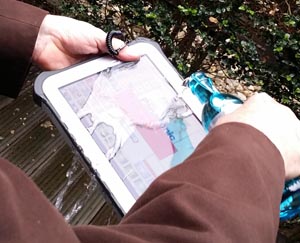 Naturally we couldn't resist taking a ToughBook outside with a bottle of water to test if it really was water proof