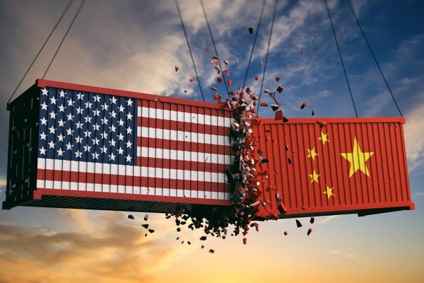 USA and China trade war. US of America and Chinese flags crashed
