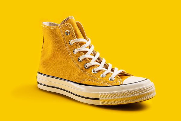 Yellow,Sneakers,On,Yellow,Background,With,Copy,Space.,Youth,Shoes.