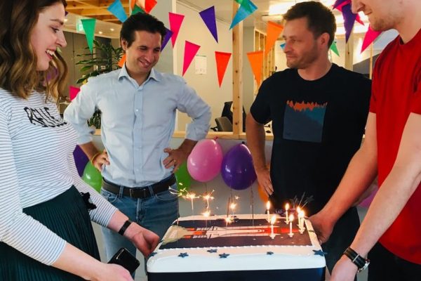 iwoca-founders-Christoph-Rieche-and-James-Dear-presented-with-iwocas-7th-birthday-cake